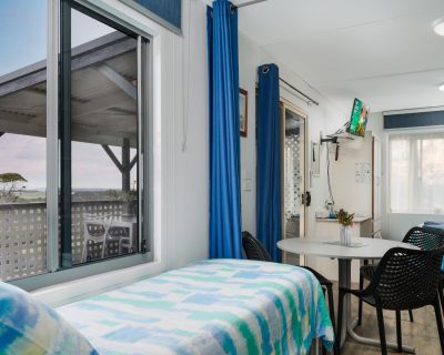2 single beds, dining table, double bed